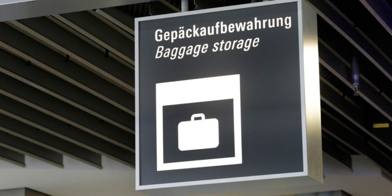 placa indicando onde deixar as bagagens em Frankfurt